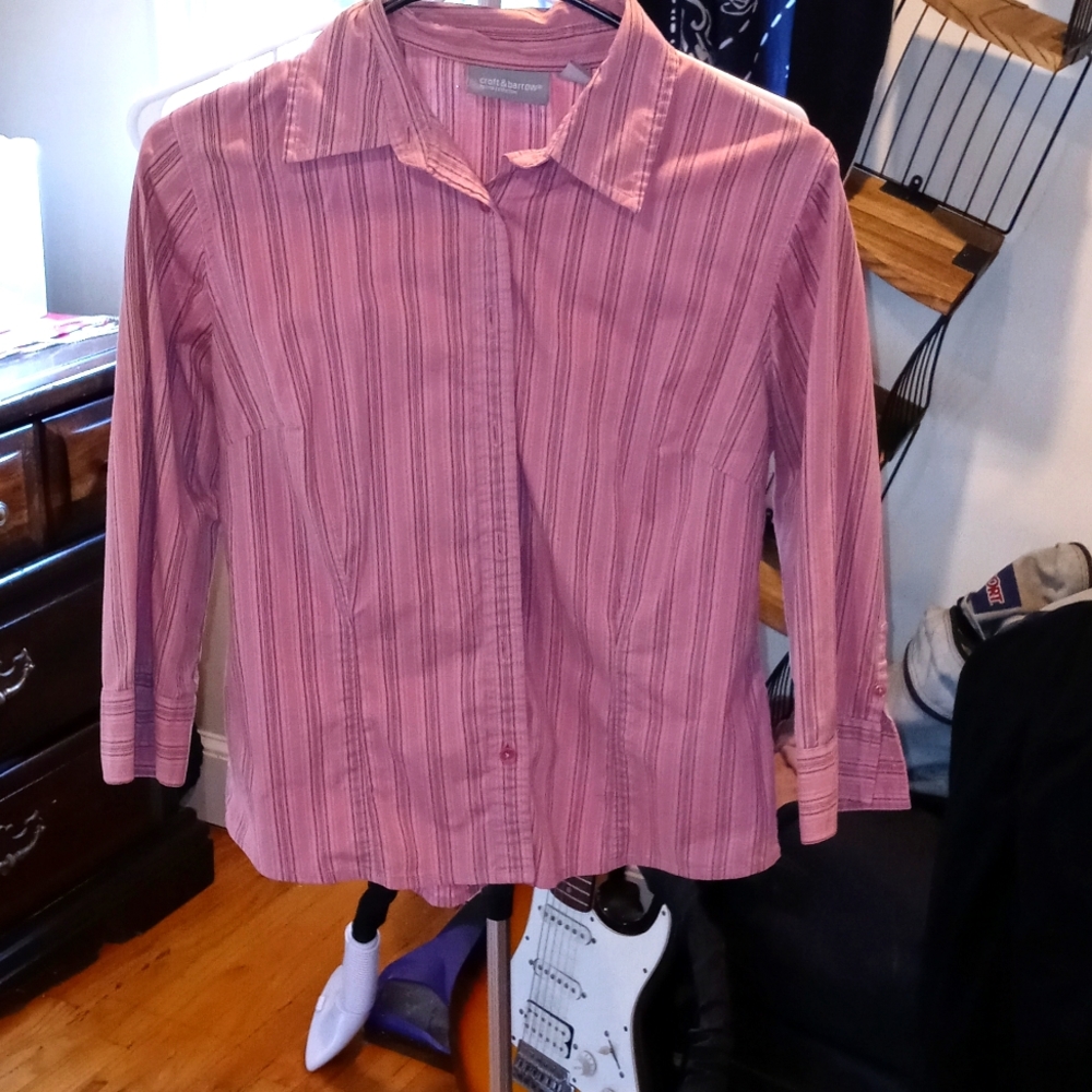 A pink and gray striped button-up shirt mid-length sleeve